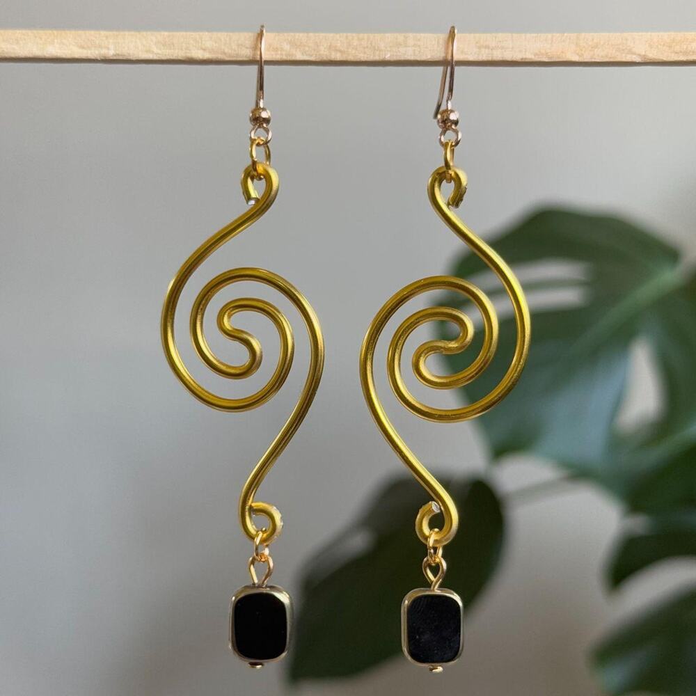handmade gold wire whirlpool spiral earrings with dangling black glass beads